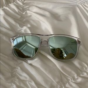 Ray-Ban RB4147 clear rimmed sun glasses.